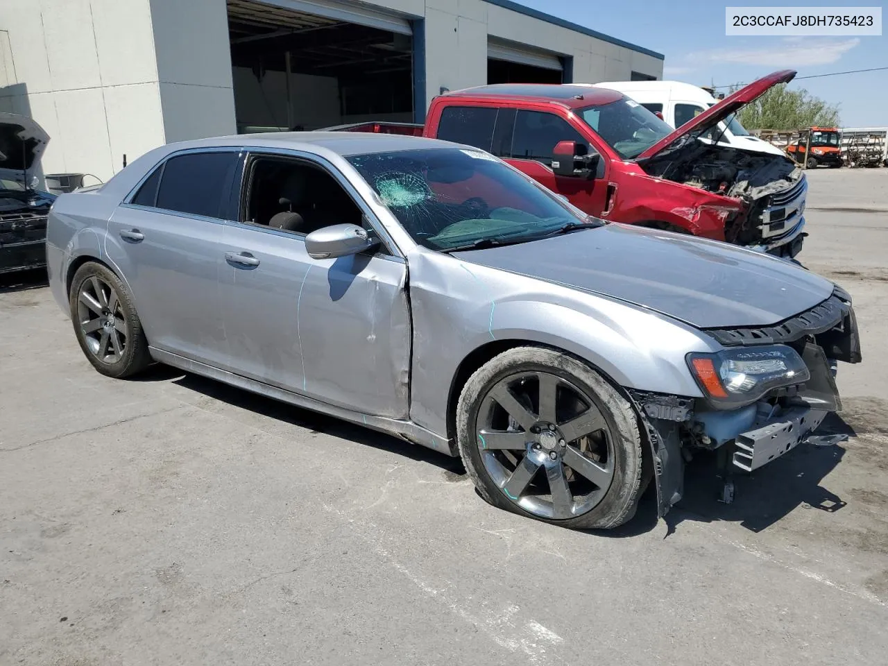 2013 Chrysler 300 Srt-8 VIN: 2C3CCAFJ8DH735423 Lot: 70628524