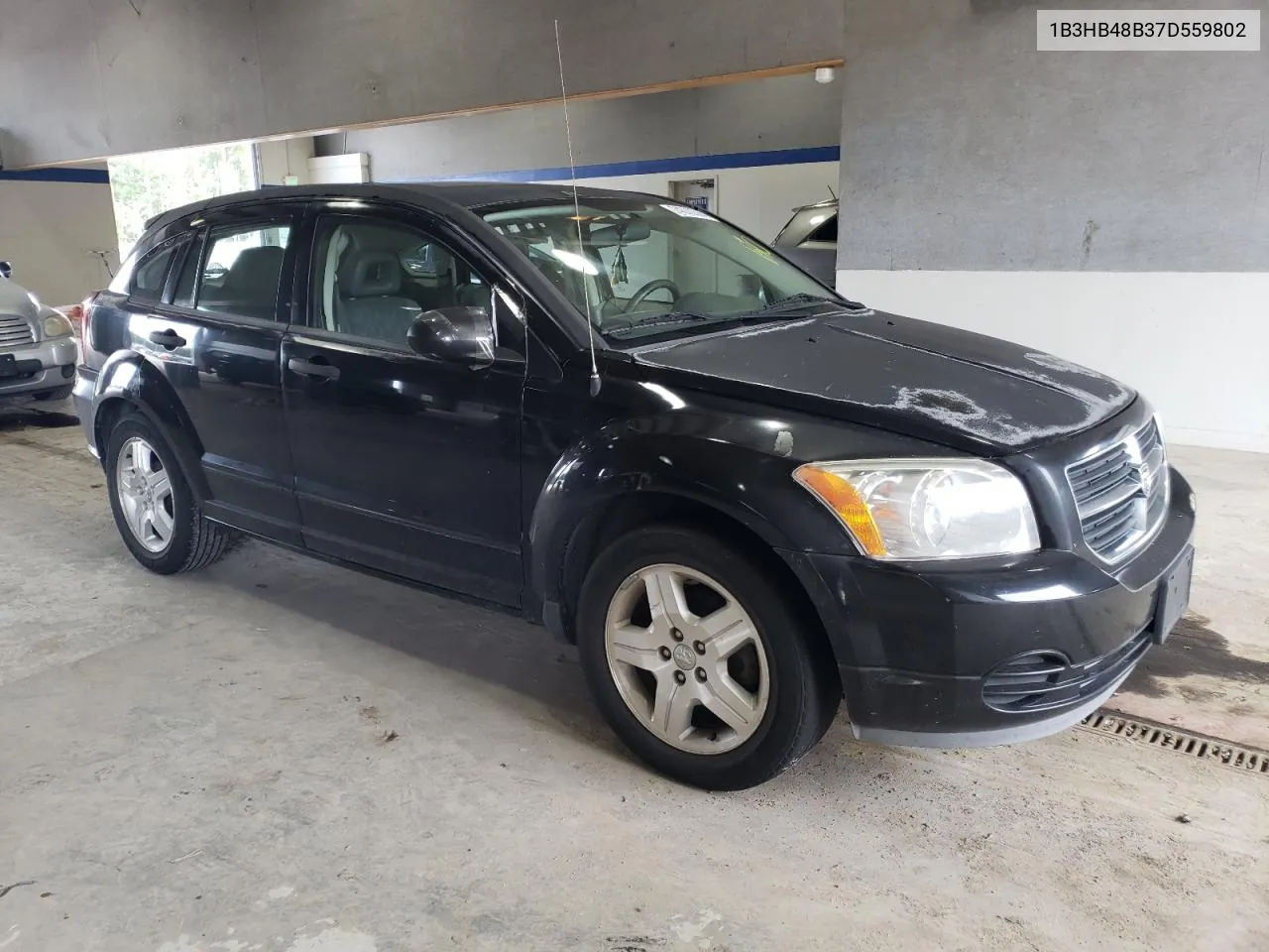 2007 Dodge Caliber Sxt VIN: 1B3HB48B37D559802 Lot: 74070364