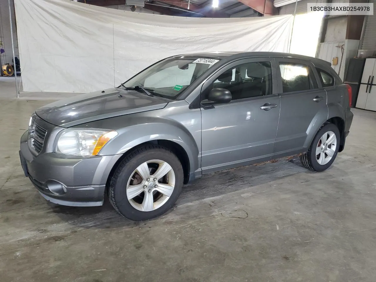 2011 Dodge Caliber Mainstreet VIN: 1B3CB3HAXBD254978 Lot: 79866894