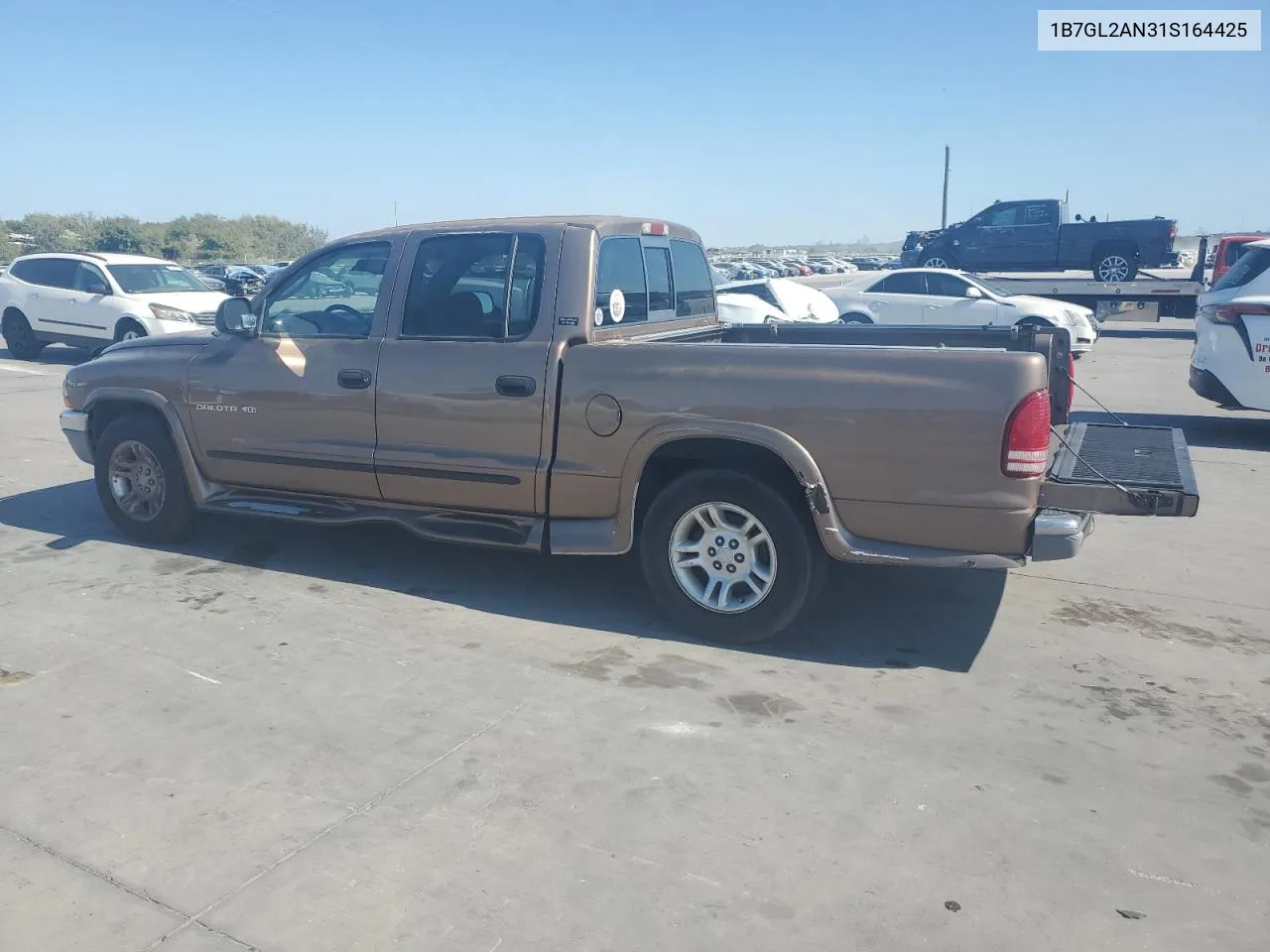 2001 Dodge Dakota Quad VIN: 1B7GL2AN31S164425 Lot: 77907144