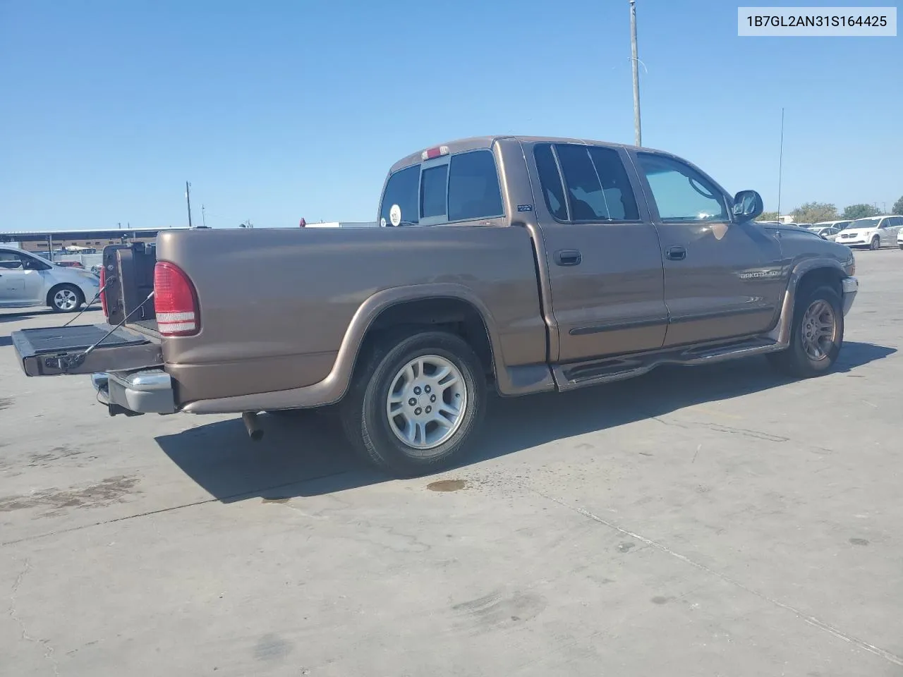 2001 Dodge Dakota Quad VIN: 1B7GL2AN31S164425 Lot: 77907144