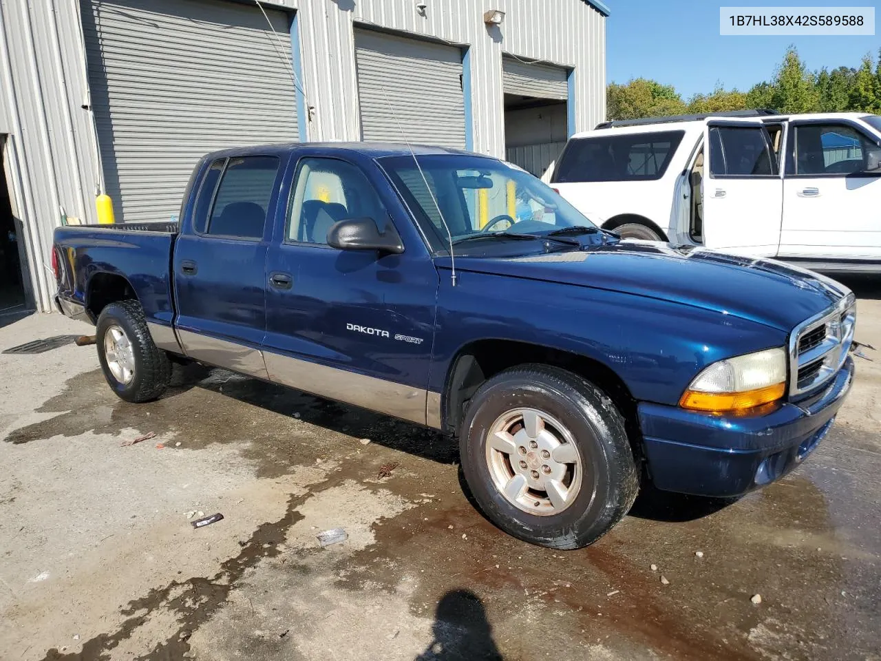 2002 Dodge Dakota Quad Sport VIN: 1B7HL38X42S589588 Lot: 75025304