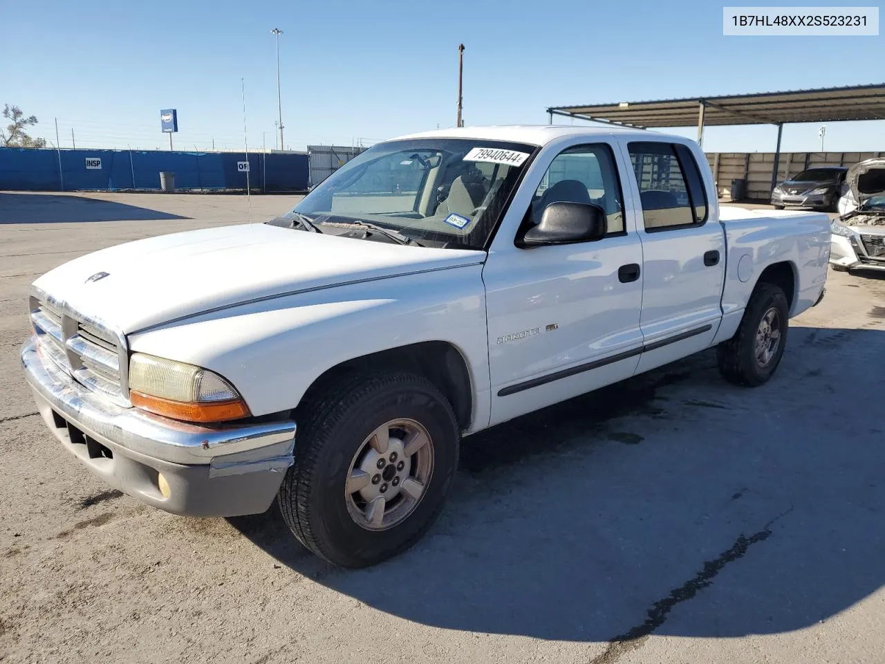 2002 Dodge Dakota Quad Slt VIN: 1B7HL48XX2S523231 Lot: 79940644