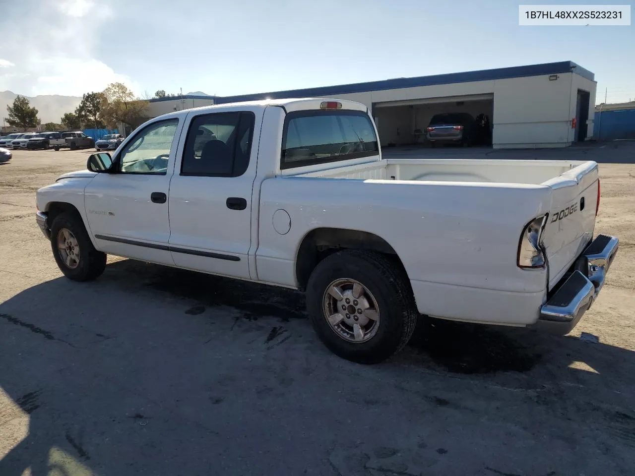 2002 Dodge Dakota Quad Slt VIN: 1B7HL48XX2S523231 Lot: 79940644