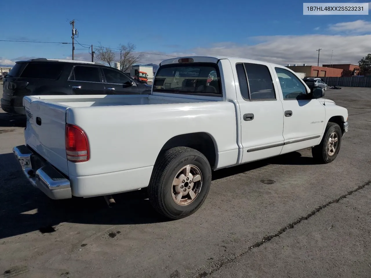 2002 Dodge Dakota Quad Slt VIN: 1B7HL48XX2S523231 Lot: 79940644