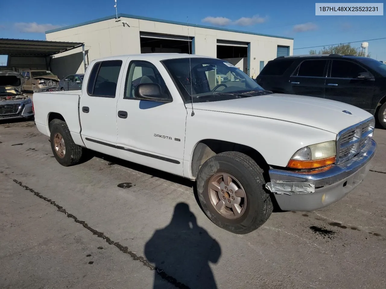 2002 Dodge Dakota Quad Slt VIN: 1B7HL48XX2S523231 Lot: 79940644