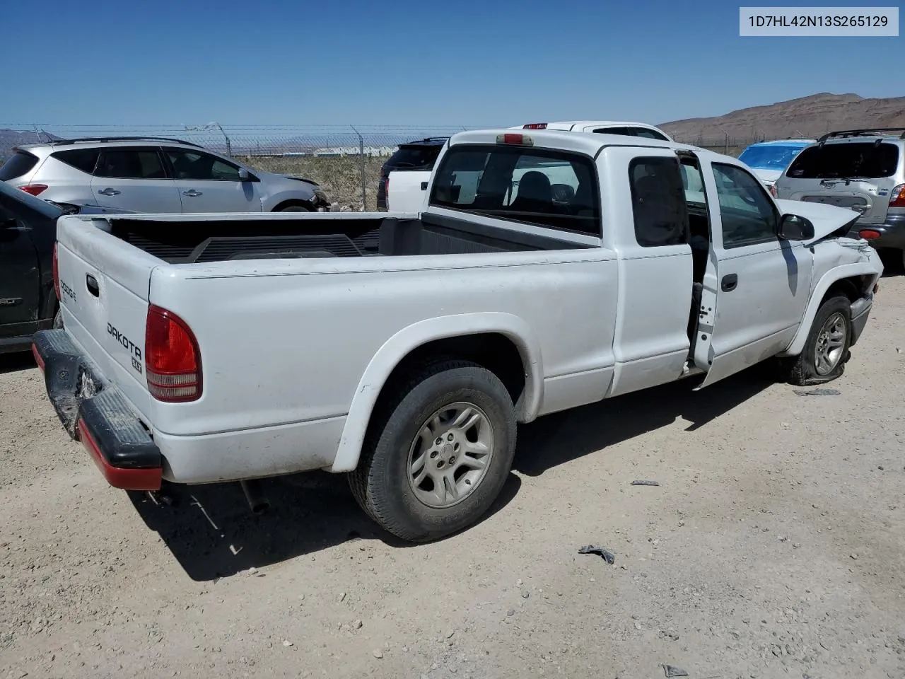 2003 Dodge Dakota Slt VIN: 1D7HL42N13S265129 Lot: 77077723