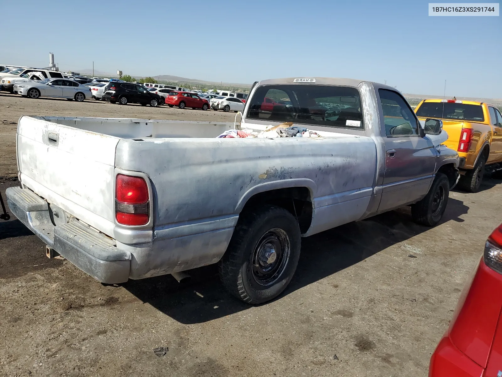 1999 Dodge Ram 1500 VIN: 1B7HC16Z3XS291744 Lot: 64903874