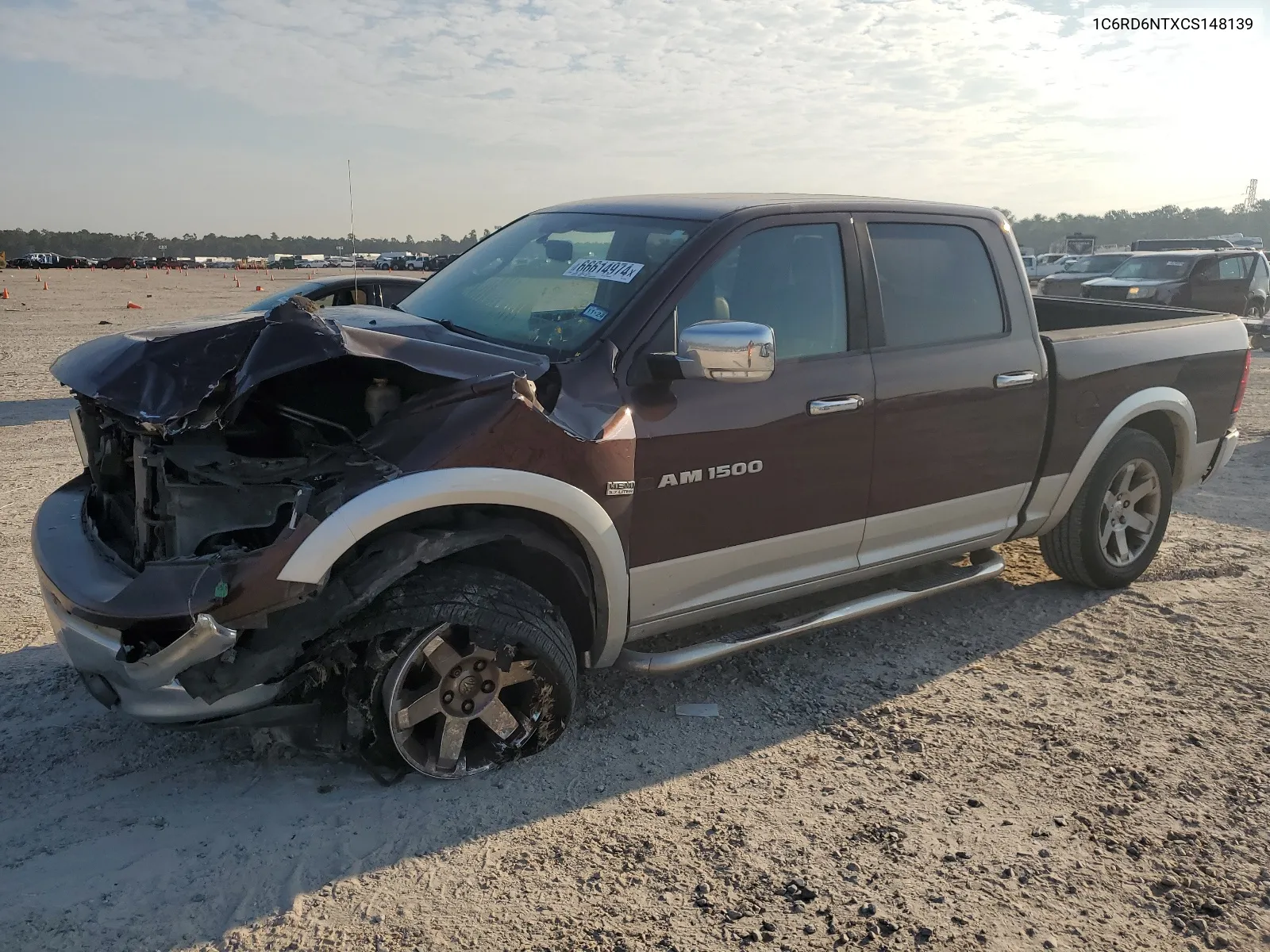 2012 Dodge Ram 1500 Laramie VIN: 1C6RD6NTXCS148139 Lot: 66614974