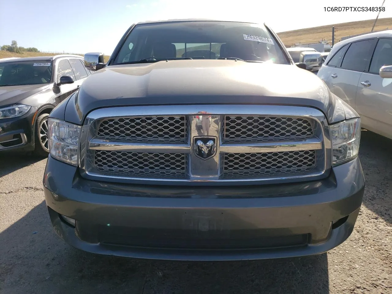 2012 Dodge Ram 1500 Longhorn VIN: 1C6RD7PTXCS348358 Lot: 74329674