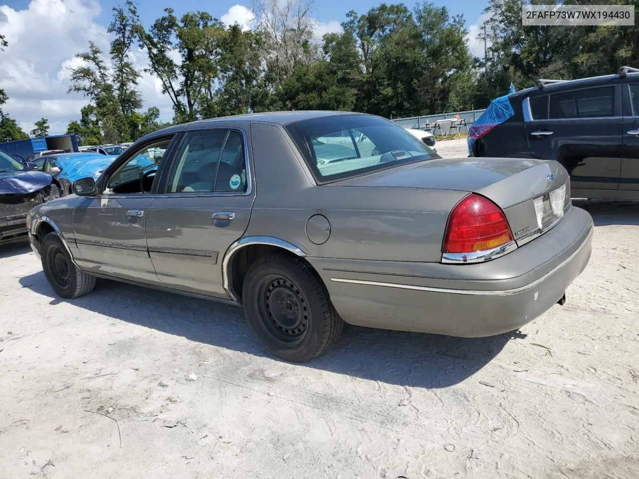 1998 Ford Crown Victoria VIN: 2FAFP73W7WX194430 Lot: 76956624