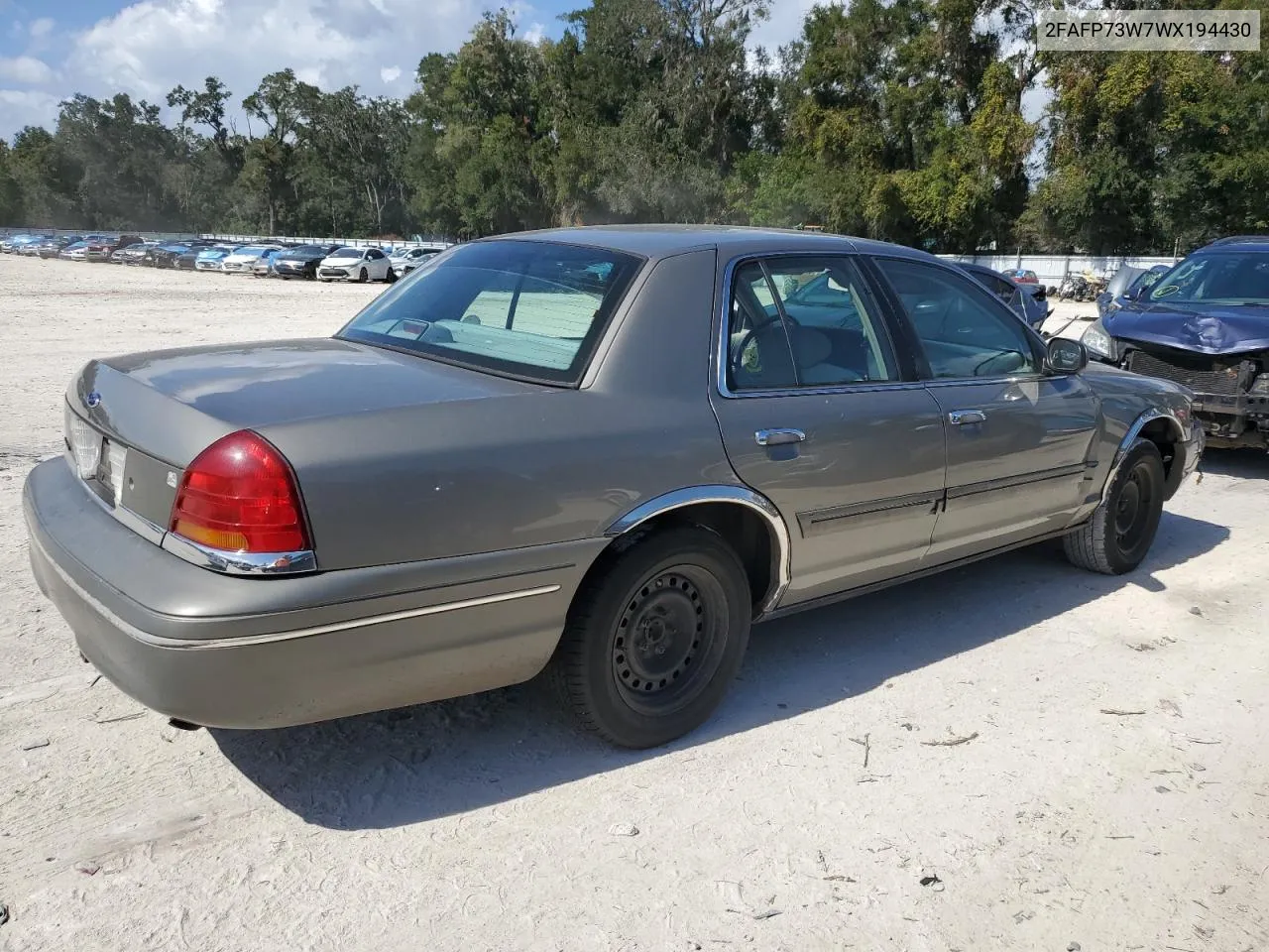 1998 Ford Crown Victoria VIN: 2FAFP73W7WX194430 Lot: 76956624