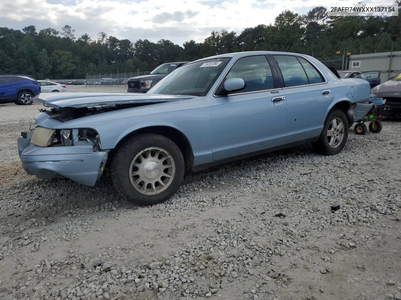 1999 Ford Crown Victoria Lx VIN: 2FAFP74WXXX137154 Lot: 71418784