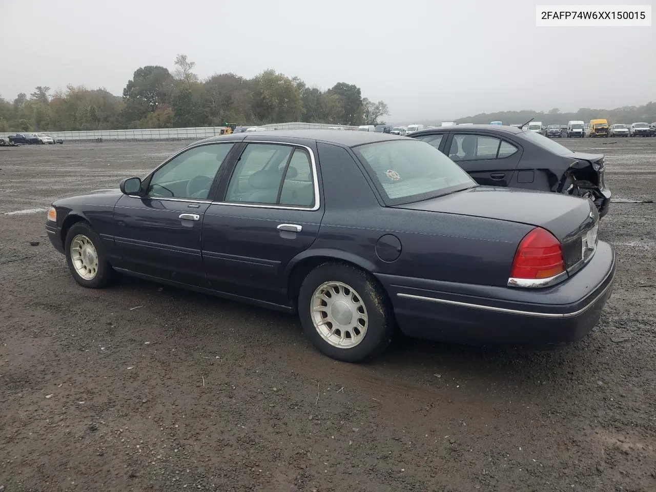 1999 Ford Crown Victoria Lx VIN: 2FAFP74W6XX150015 Lot: 75331014