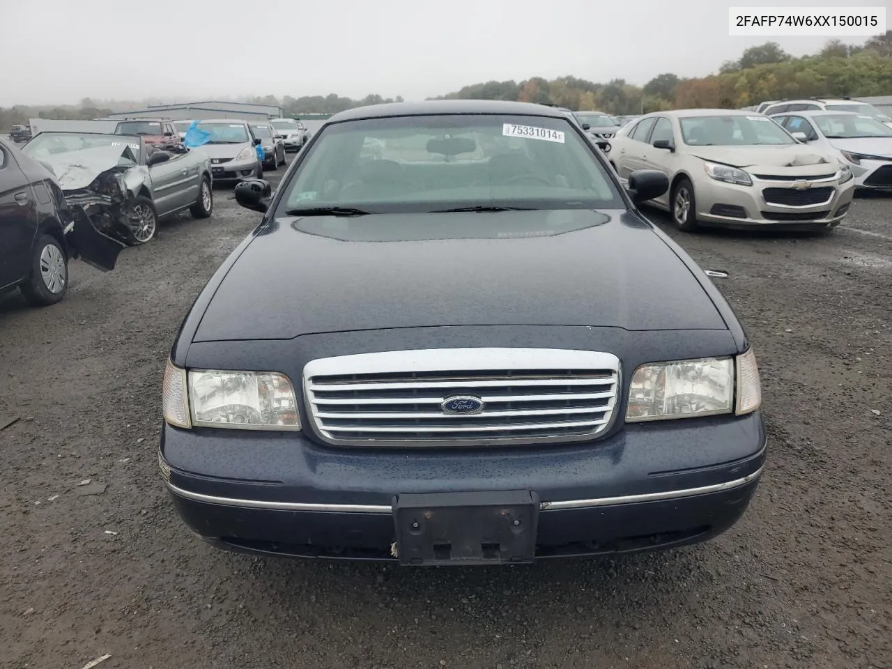 1999 Ford Crown Victoria Lx VIN: 2FAFP74W6XX150015 Lot: 75331014