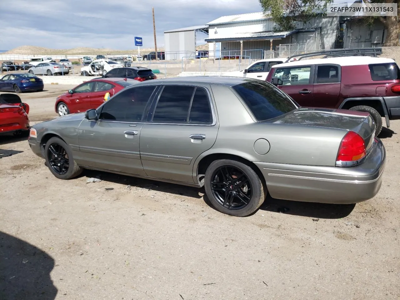 2001 Ford Crown Victoria VIN: 2FAFP73W11X131543 Lot: 69468344