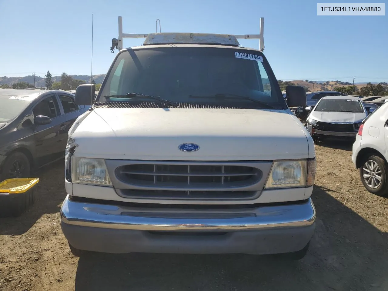 1997 Ford Econoline E350 Super Duty Van VIN: 1FTJS34L1VHA48880 Lot: 77401144