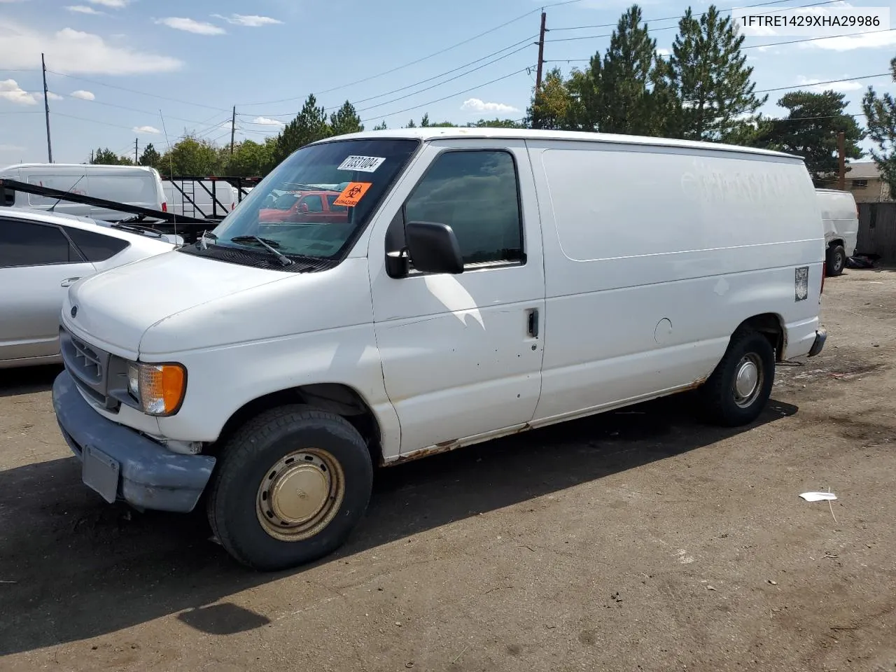 1999 Ford Econoline E150 Van VIN: 1FTRE1429XHA29986 Lot: 70331004