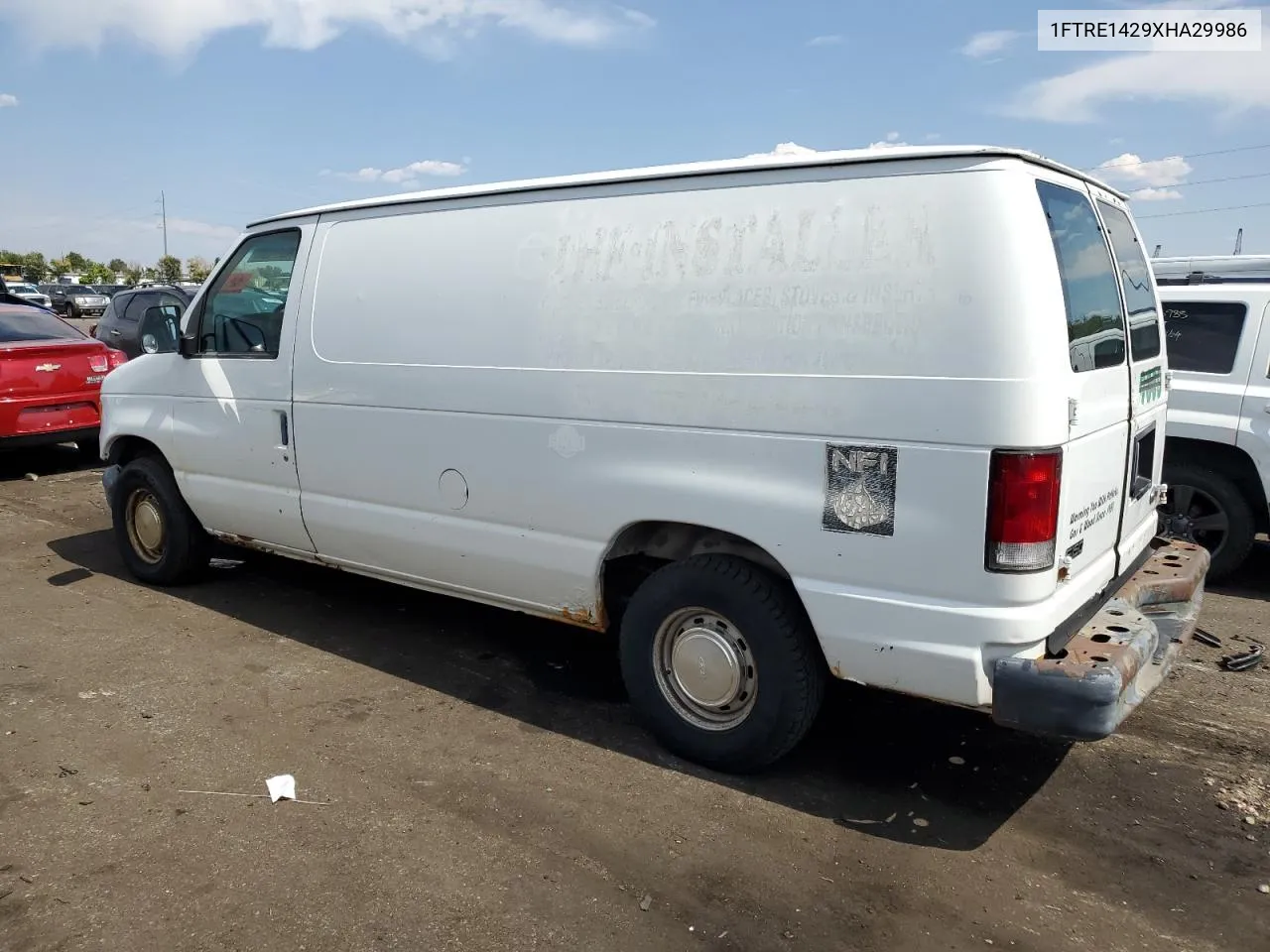 1999 Ford Econoline E150 Van VIN: 1FTRE1429XHA29986 Lot: 70331004