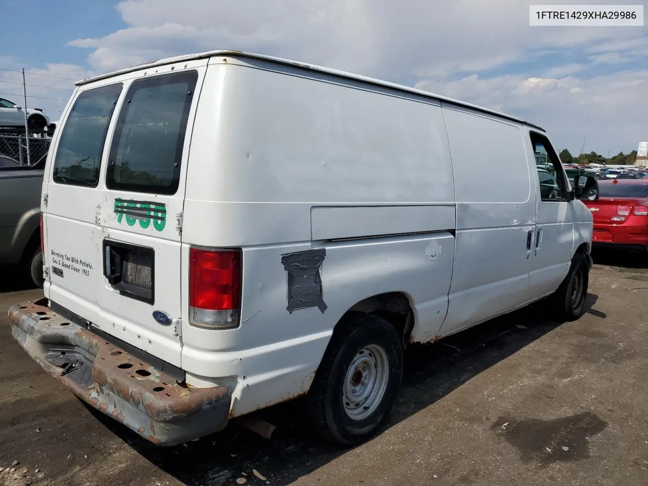 1999 Ford Econoline E150 Van VIN: 1FTRE1429XHA29986 Lot: 70331004