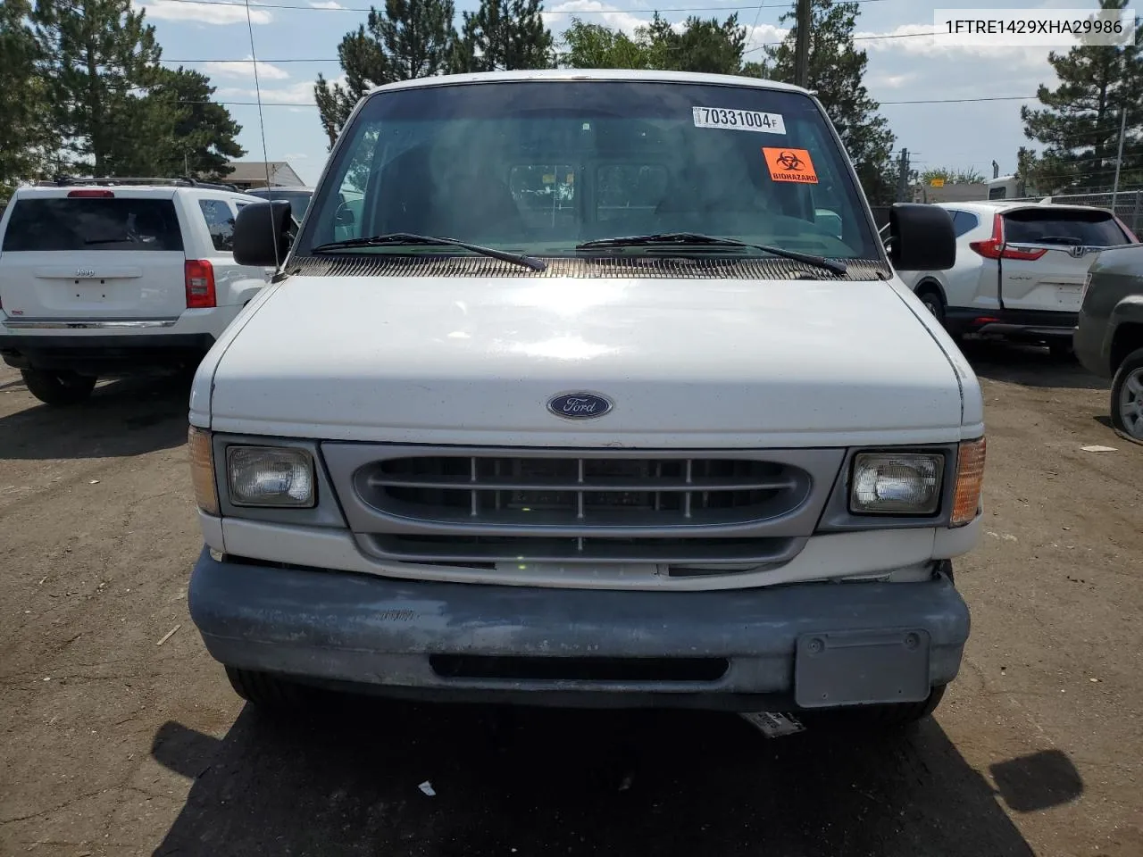 1999 Ford Econoline E150 Van VIN: 1FTRE1429XHA29986 Lot: 70331004