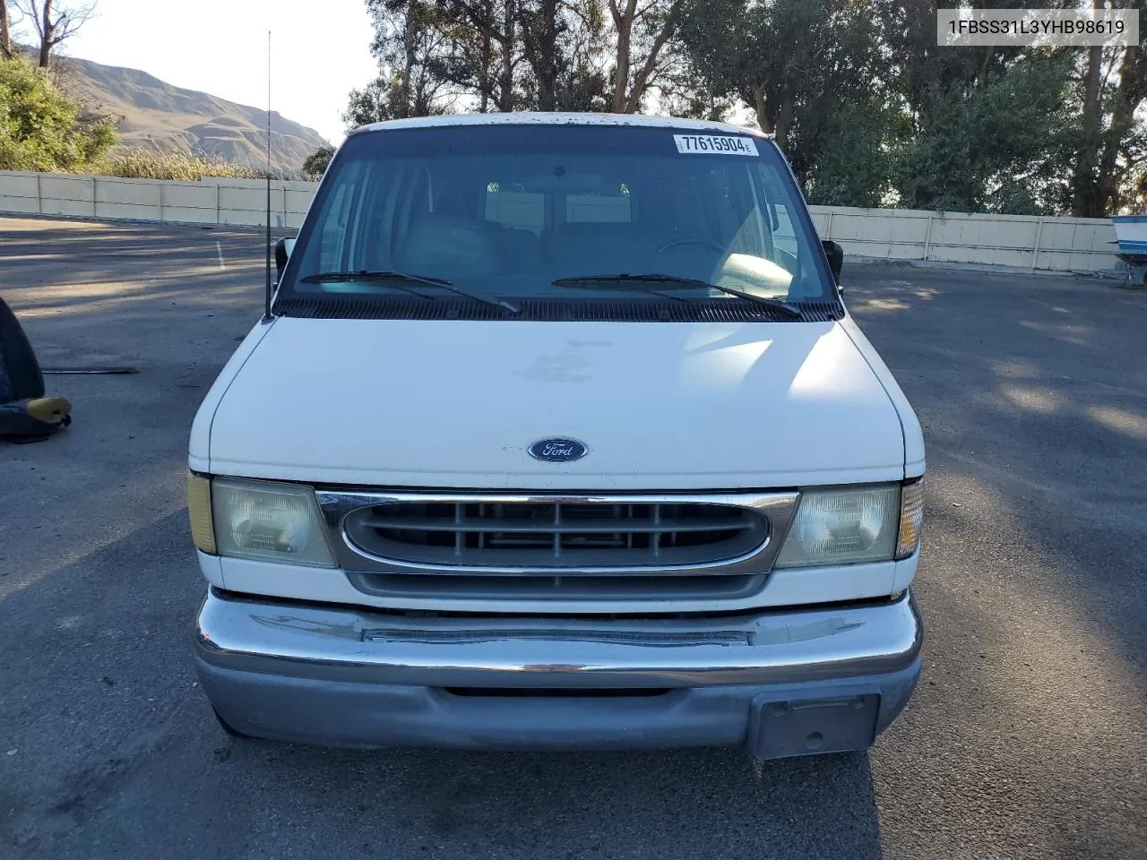 2000 Ford Econoline E350 Super Duty Wagon VIN: 1FBSS31L3YHB98619 Lot: 77615904