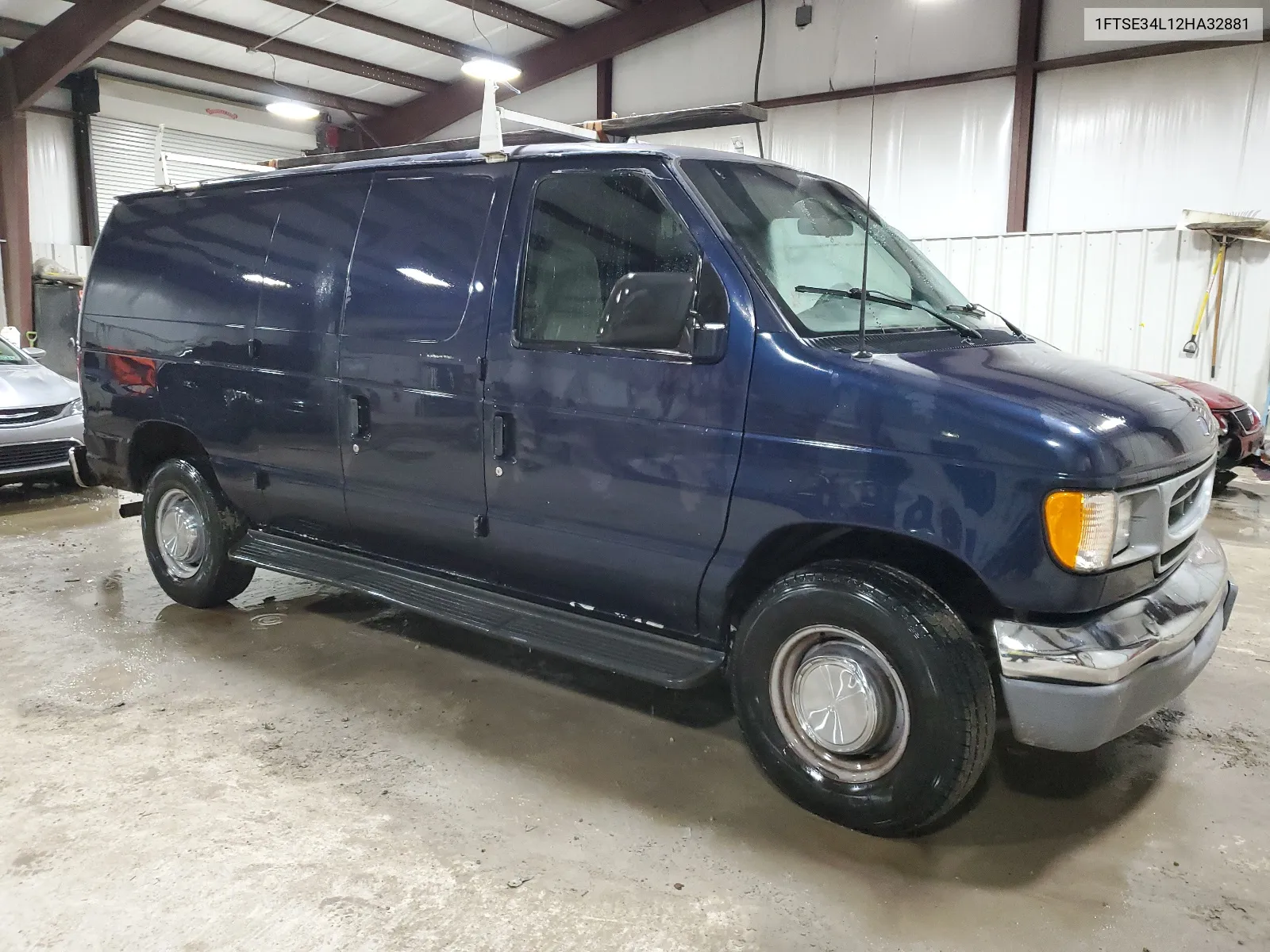 2002 Ford Econoline E350 Super Duty Van VIN: 1FTSE34L12HA32881 Lot: 40523454