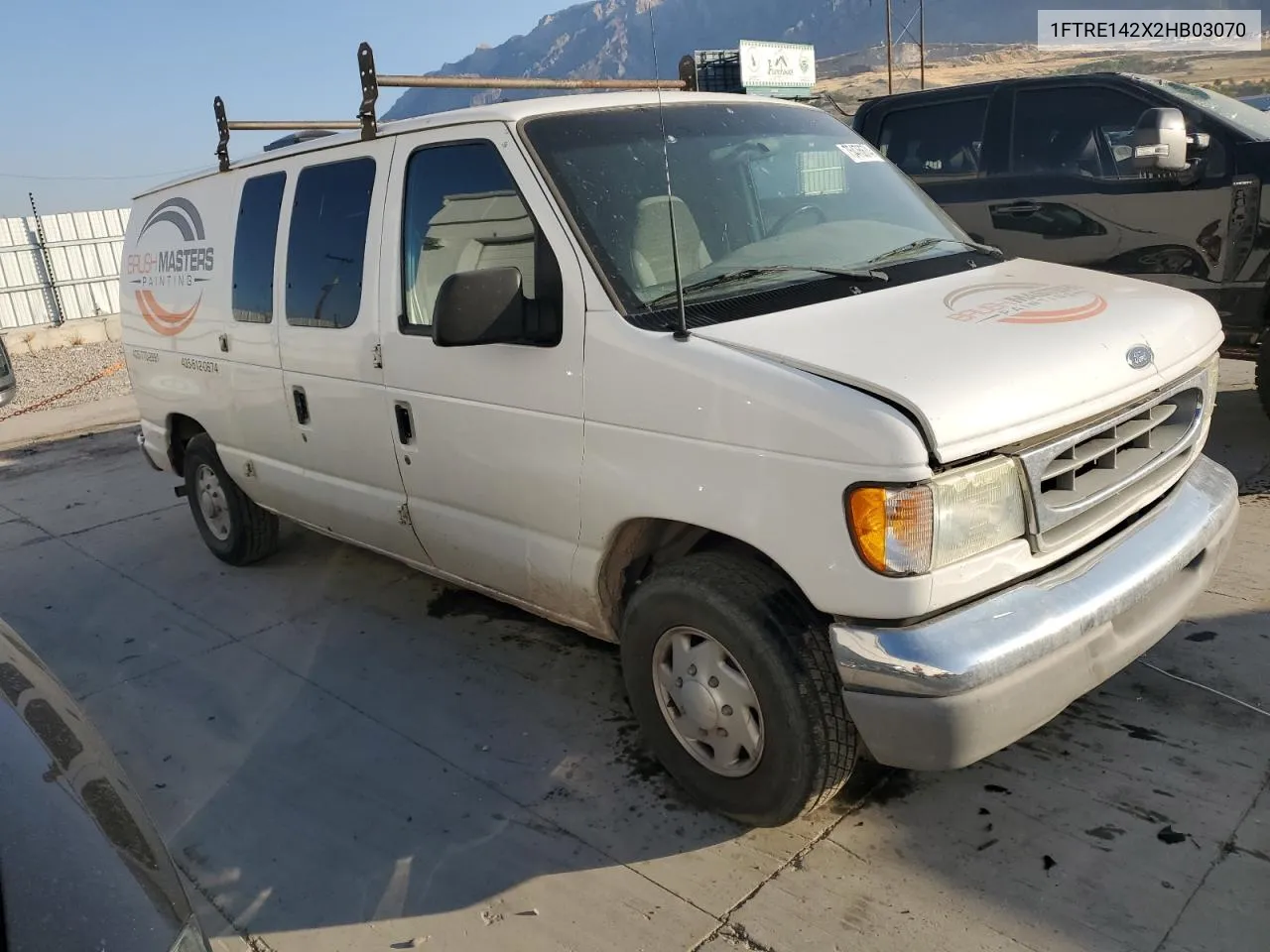 2002 Ford Econoline E150 Van VIN: 1FTRE142X2HB03070 Lot: 75476674