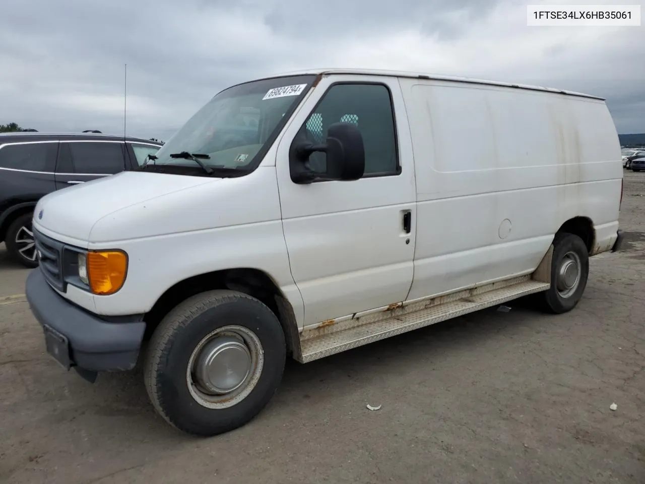 2006 Ford Econoline E350 Super Duty Van VIN: 1FTSE34LX6HB35061 Lot: 69824794