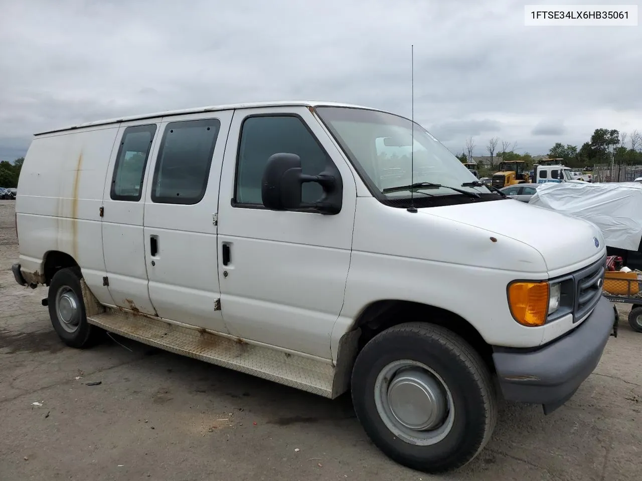 2006 Ford Econoline E350 Super Duty Van VIN: 1FTSE34LX6HB35061 Lot: 69824794