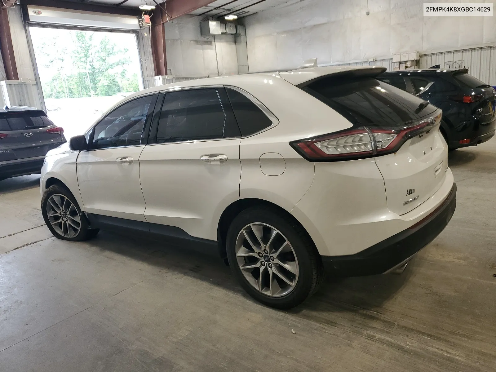 2016 Ford Edge Titanium VIN: 2FMPK4K8XGBC14629 Lot: 66079314