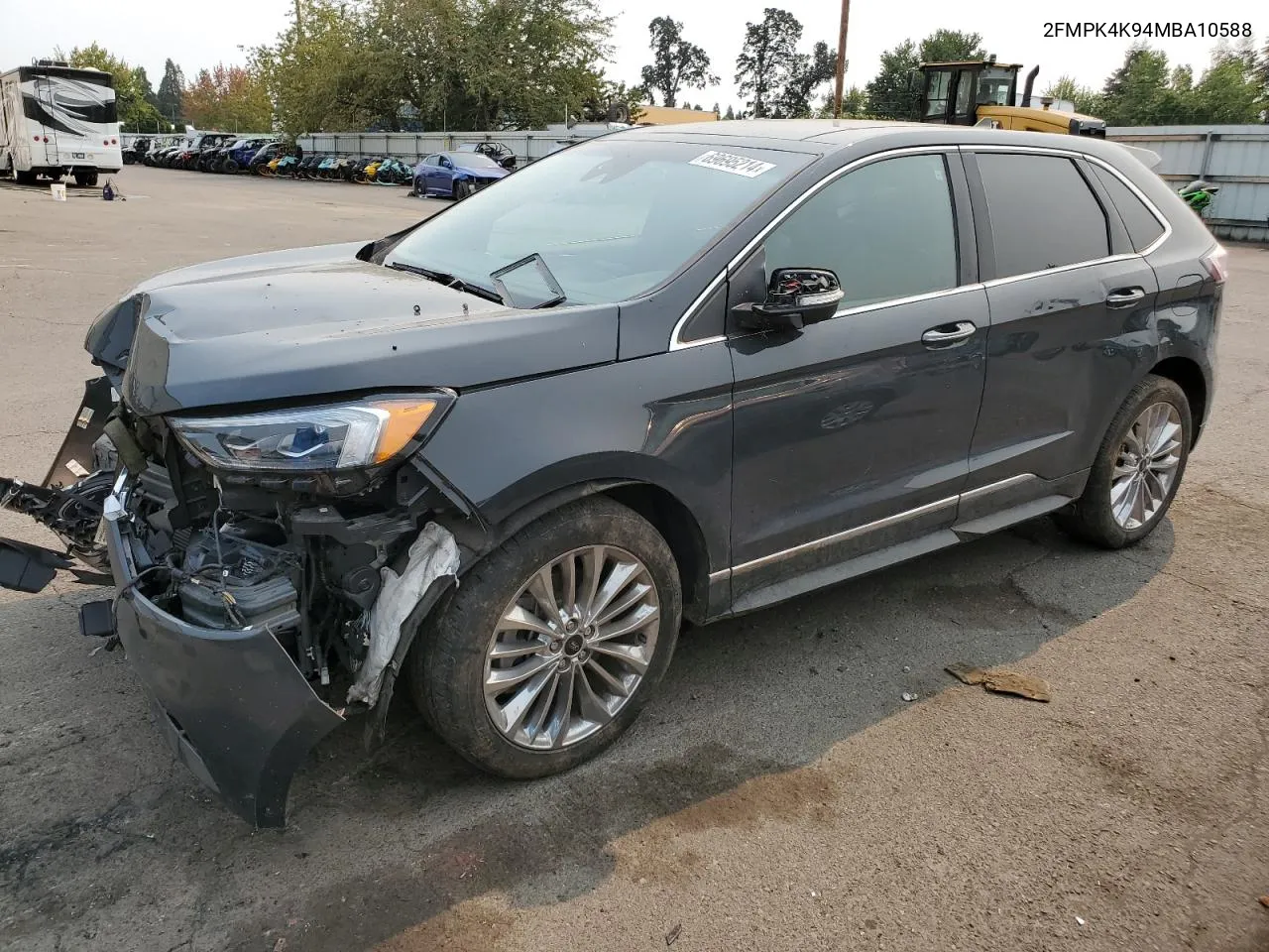 2021 Ford Edge Titanium VIN: 2FMPK4K94MBA10588 Lot: 69695214