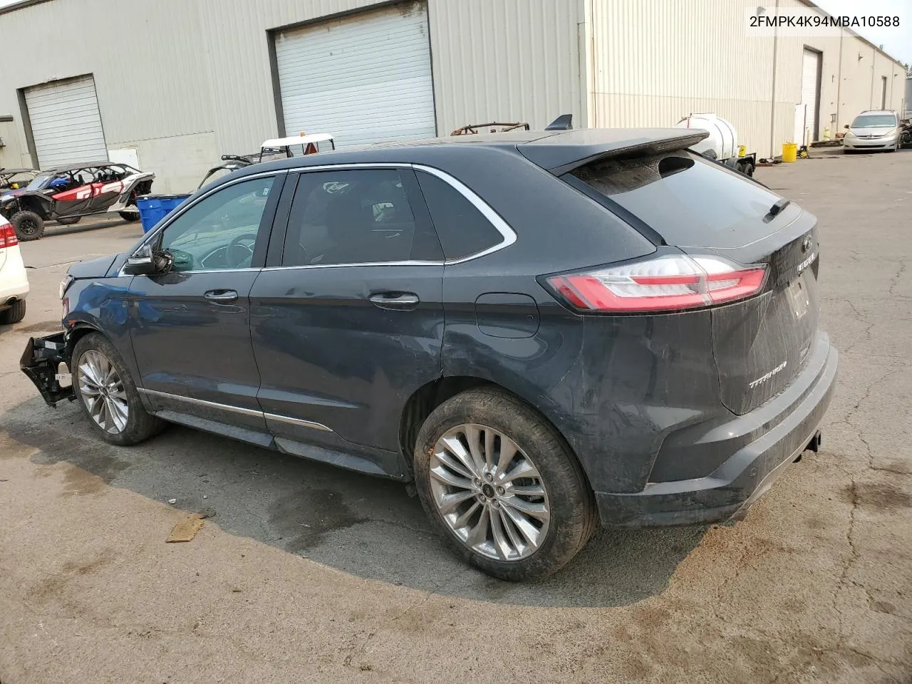 2021 Ford Edge Titanium VIN: 2FMPK4K94MBA10588 Lot: 69695214