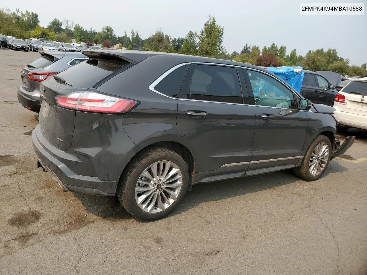 2021 Ford Edge Titanium VIN: 2FMPK4K94MBA10588 Lot: 69695214