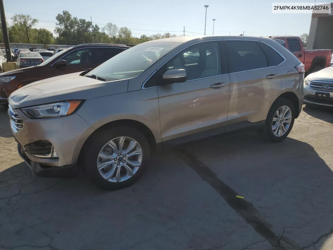 2021 Ford Edge Titanium VIN: 2FMPK4K98MBA52746 Lot: 74600184