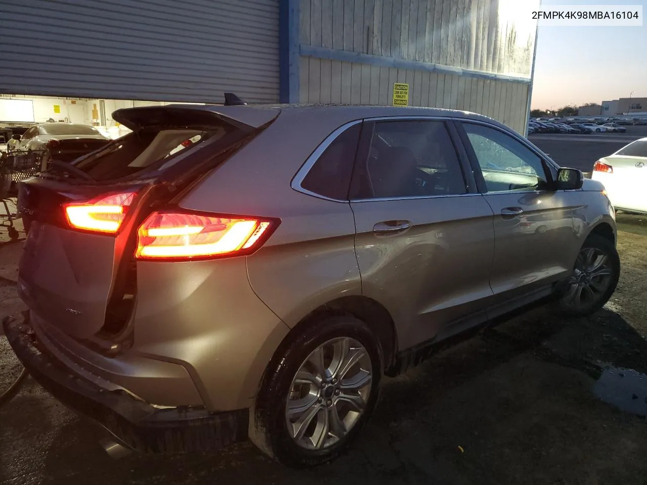 2021 Ford Edge Titanium VIN: 2FMPK4K98MBA16104 Lot: 76772274