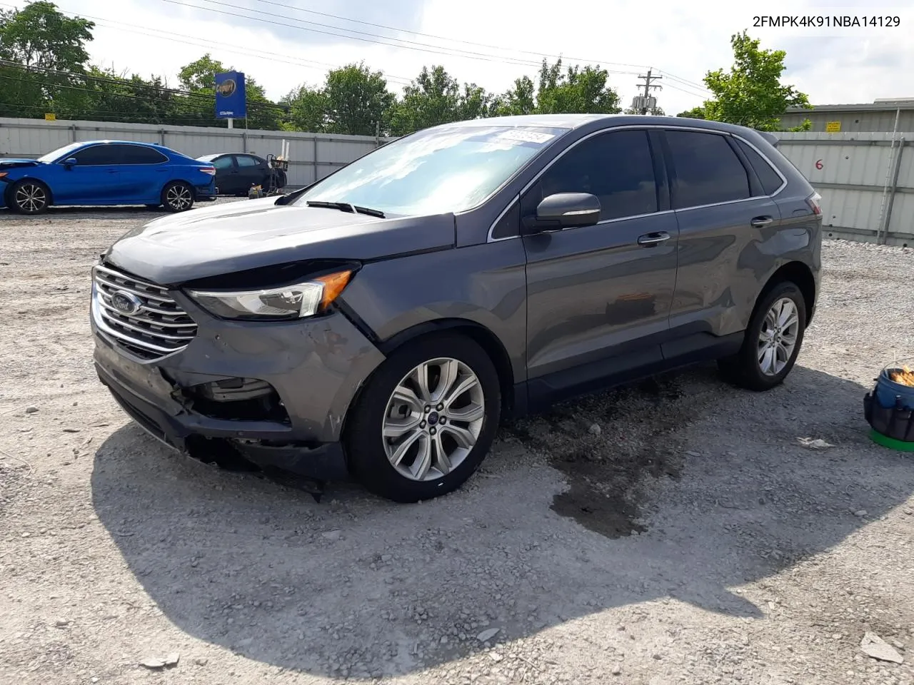 2022 Ford Edge Titanium VIN: 2FMPK4K91NBA14129 Lot: 64643244