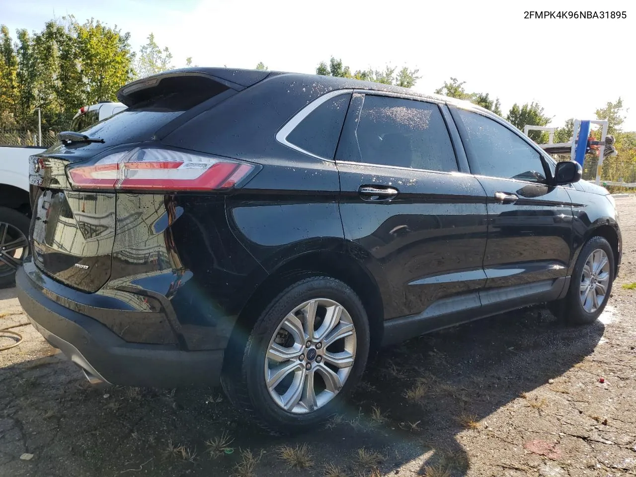 2022 Ford Edge Titanium VIN: 2FMPK4K96NBA31895 Lot: 74512174