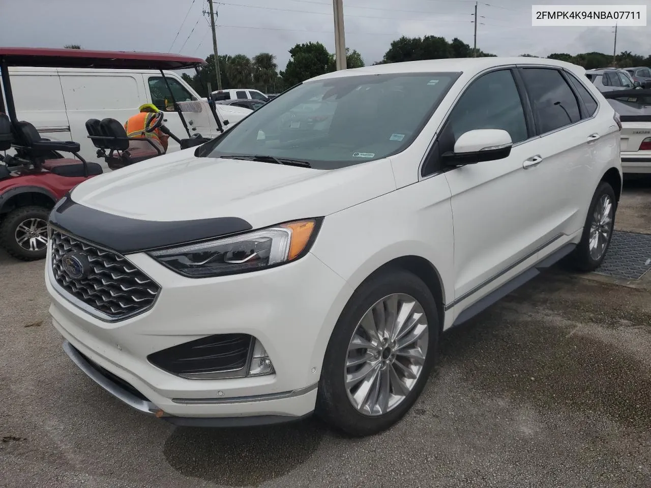 2022 Ford Edge Titanium VIN: 2FMPK4K94NBA07711 Lot: 75031974