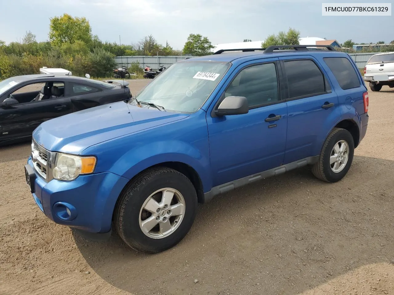 2011 Ford Escape Xlt VIN: 1FMCU0D77BKC61329 Lot: 69784344