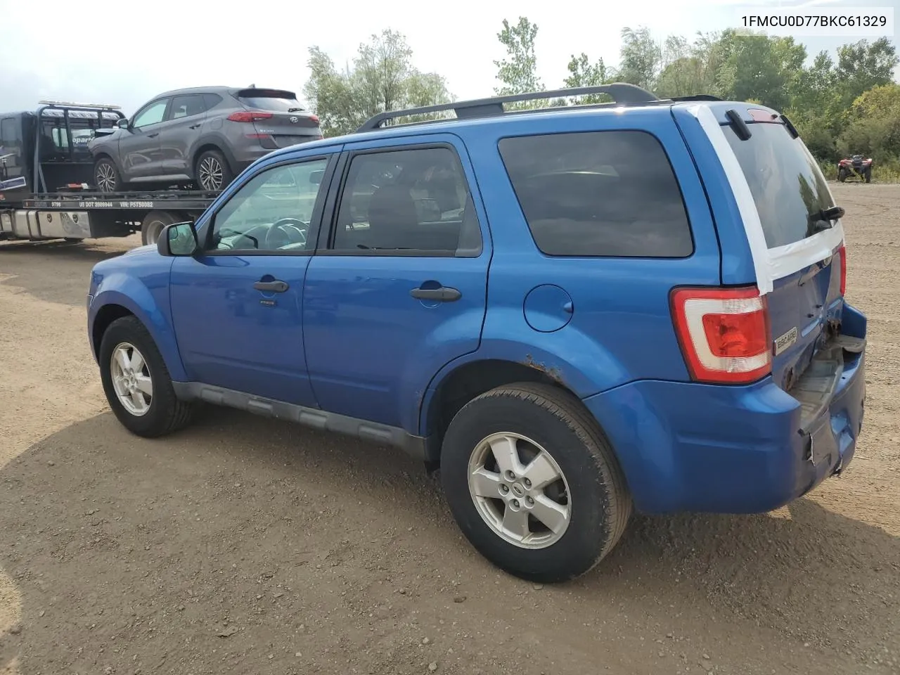 2011 Ford Escape Xlt VIN: 1FMCU0D77BKC61329 Lot: 69784344