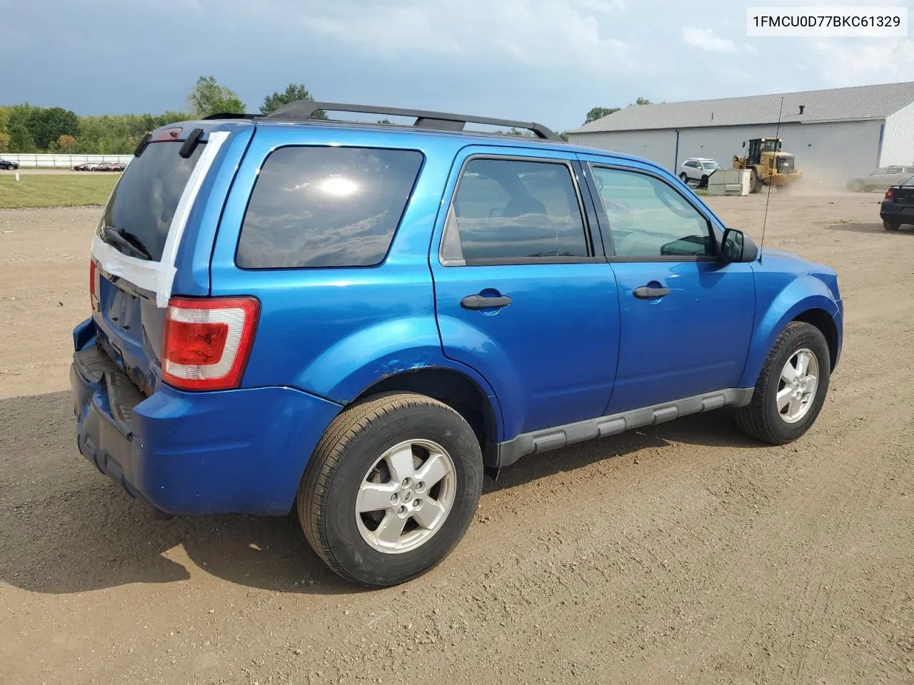 2011 Ford Escape Xlt VIN: 1FMCU0D77BKC61329 Lot: 69784344