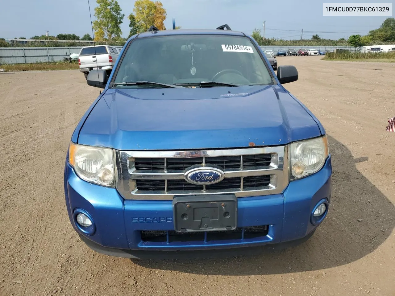 2011 Ford Escape Xlt VIN: 1FMCU0D77BKC61329 Lot: 69784344