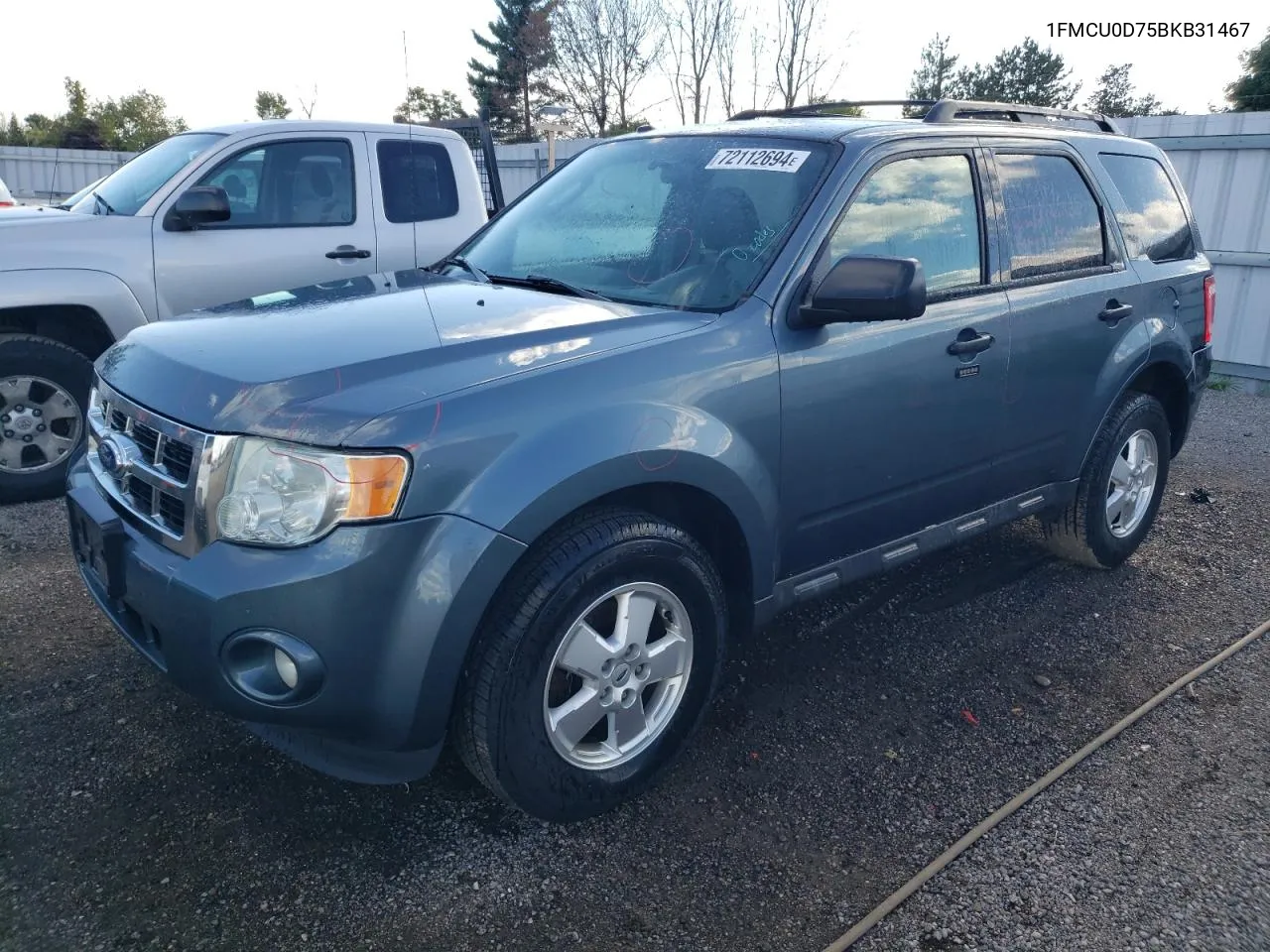 2011 Ford Escape Xlt VIN: 1FMCU0D75BKB31467 Lot: 72112694