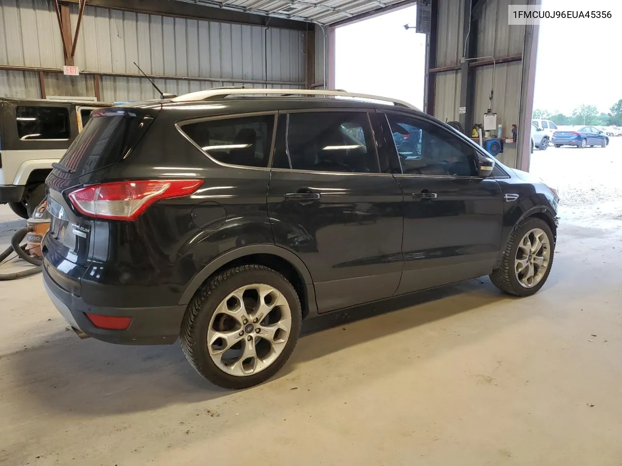 1FMCU0J96EUA45356 2014 Ford Escape Titanium