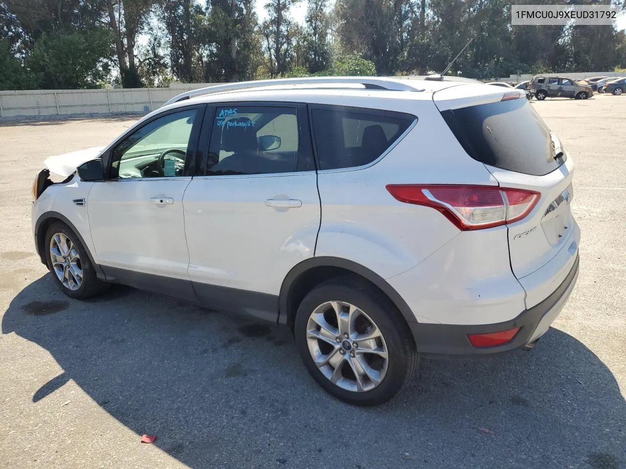 2014 Ford Escape Titanium VIN: 1FMCU0J9XEUD31792 Lot: 58696873