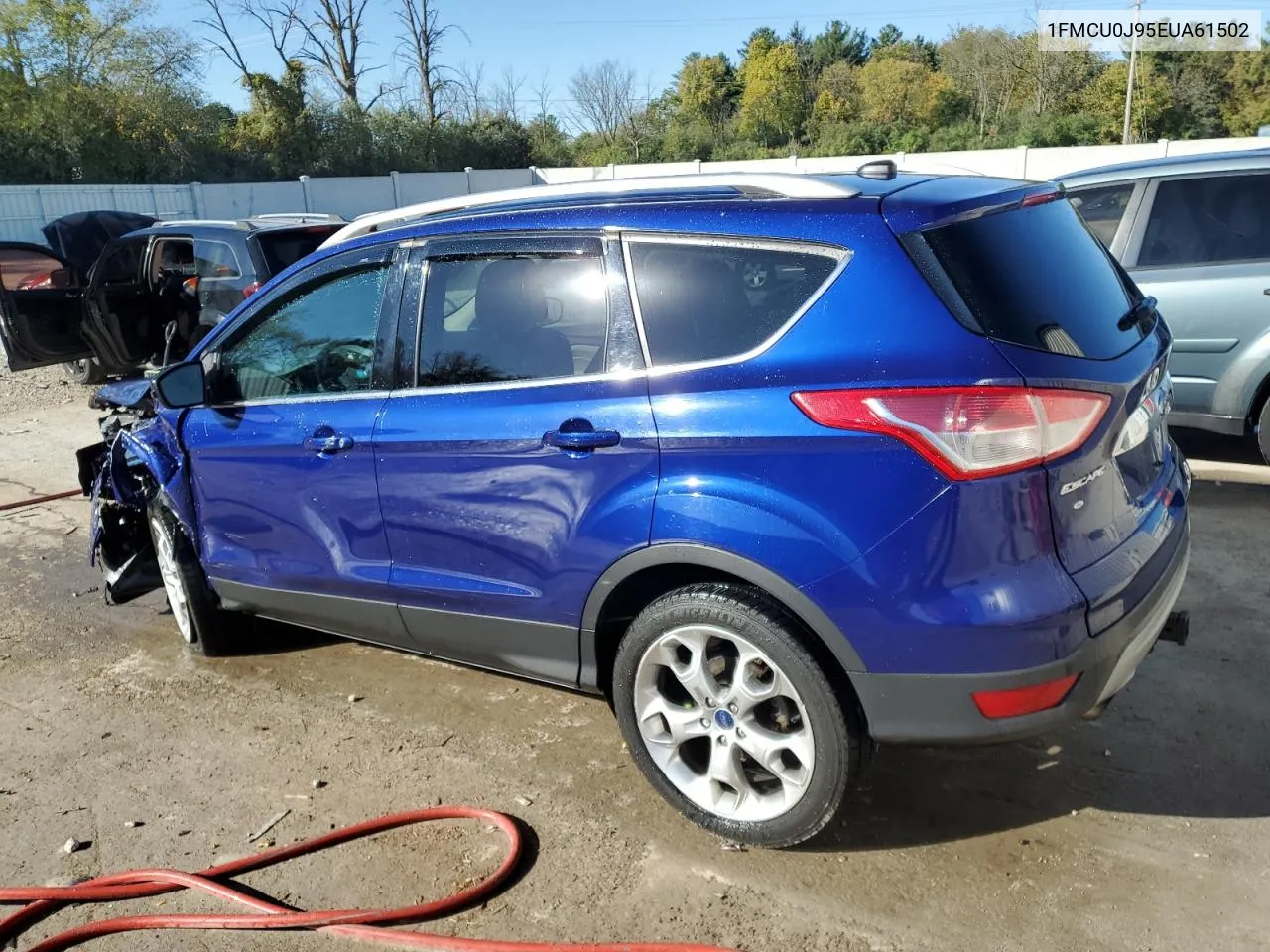 2014 Ford Escape Titanium VIN: 1FMCU0J95EUA61502 Lot: 74907684