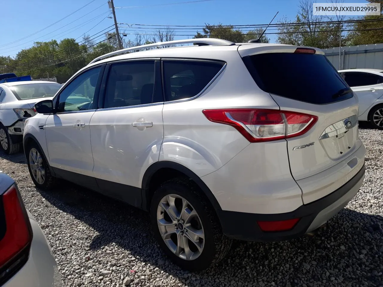 2014 Ford Escape Titanium VIN: 1FMCU9JXXEUD29995 Lot: 74970454