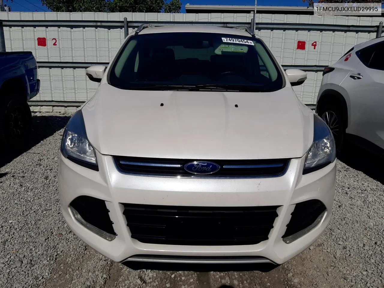 2014 Ford Escape Titanium VIN: 1FMCU9JXXEUD29995 Lot: 74970454