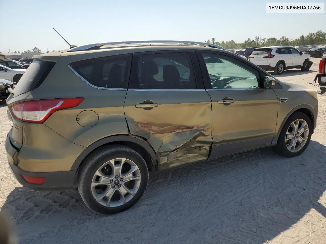 2014 Ford Escape Titanium VIN: 1FMCU9J95EUA07766 Lot: 76121634